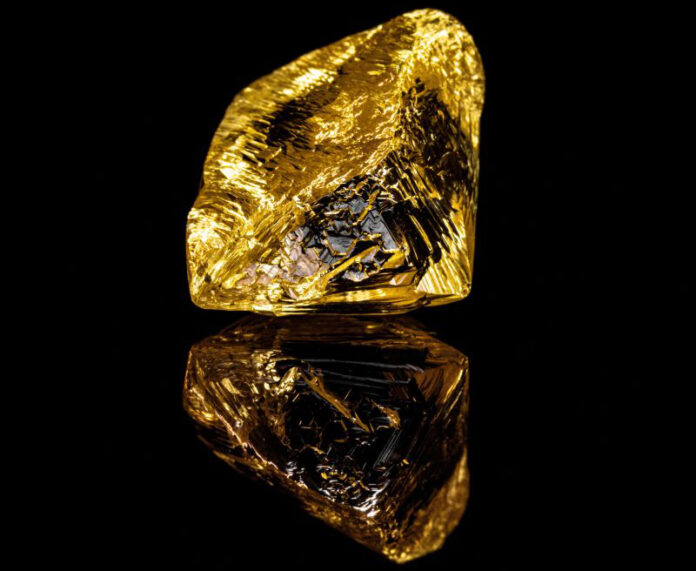 A 36.0 carat fancy vivid yellow diamond