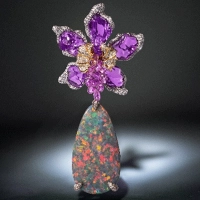 7 irresistible reasons to visit Jewellery & Gem ASIA next month! 5 Glamour Fine Jewelry Australian black opal and unheated violet sapphire brooch/pendant. The opal displays a deep body tone featuring the harlequin pattern