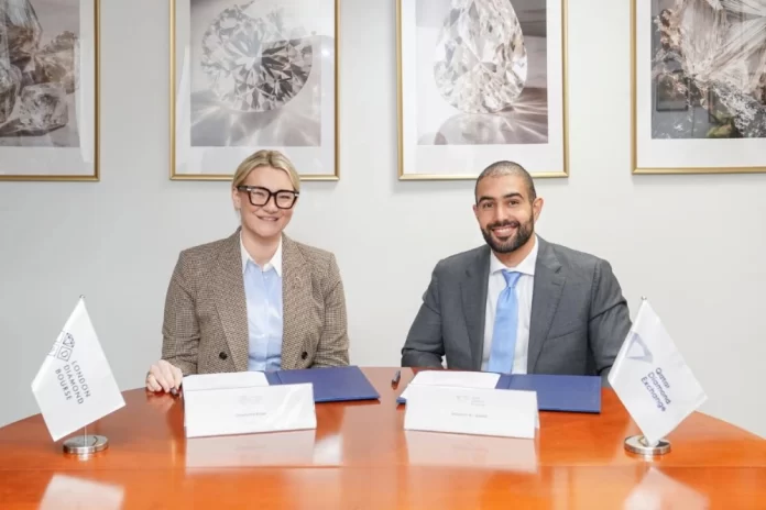 London Diamond Bourse (LDB) Charlotte Rose (left) and Qatar Diamond Exchange (QDE) Ghanim al-Saadi at the signing of the LDB-QDE MoU